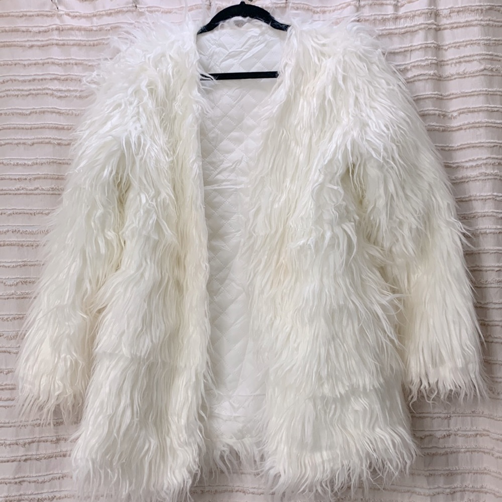 White faux fur coat